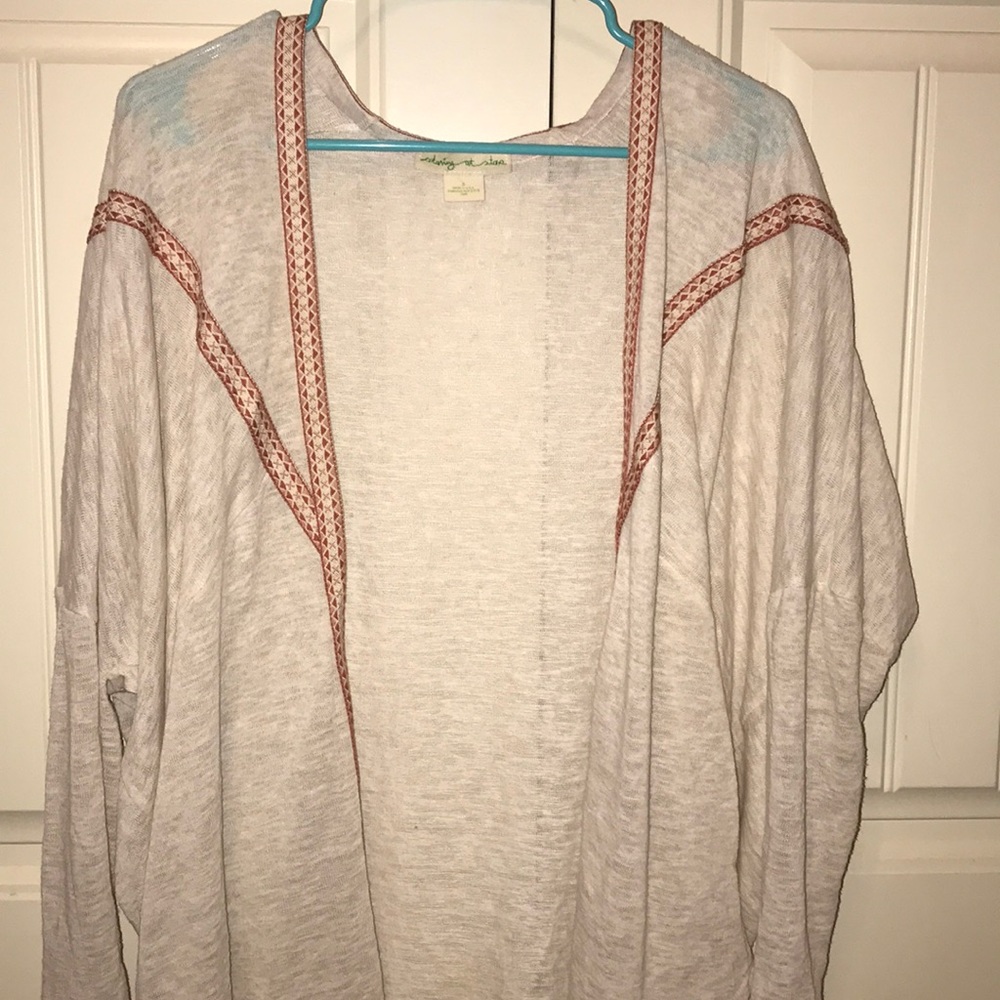 cream sweater with Aztec design